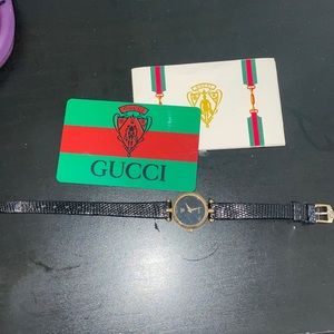 Authentic vintage Gucci gold and black leather watch